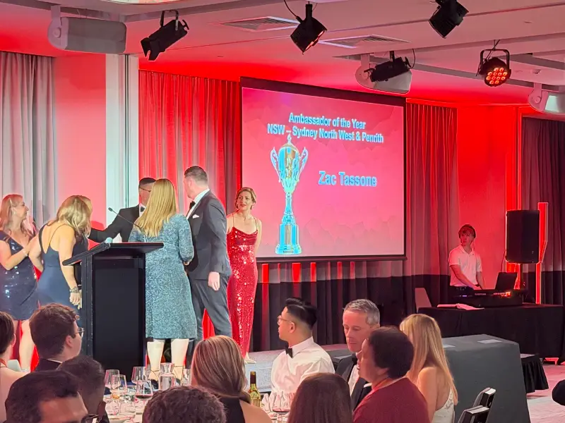 Zac Tassone announced as Ambassador of the Year for BNI Sydney North West and Penrith on stage at the BNI Australia National Conference