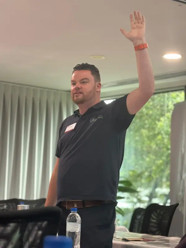 Zac Tassone presenting a business education session